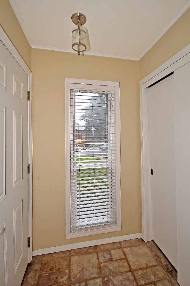 tled entry with window and coat closet