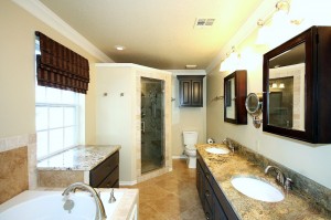 Remodeled master bath with 2-sink granite vanity, separate shower with tumbled marble tiling, travertine flooring and an air bath for your indulgent relaxation; plenty of storage