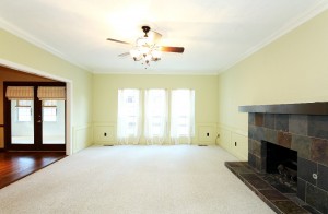 Large family room with sufficient electrical outlets for all your electronics; fresh paint, updated fixture, slate fireplace