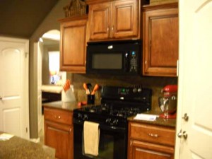 Updated kitchen with beautiful cabinetry, built-in microwave