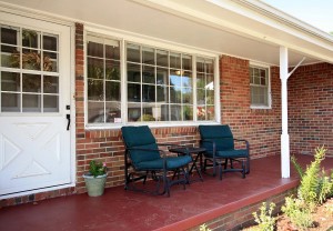 Covered porch in midtown Tulsa home for sale