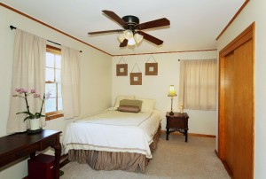 Master bedroom with private full bath in midtown Tulsa home for sale