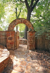 arched gate on stone path