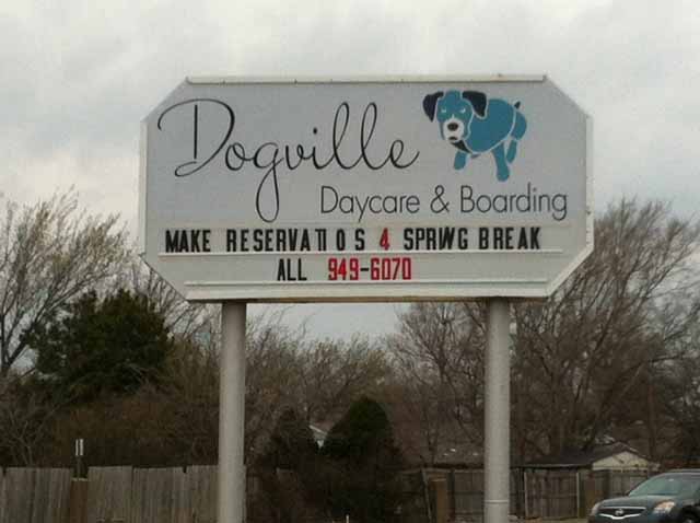sign for Dogville Daycare and Boarding