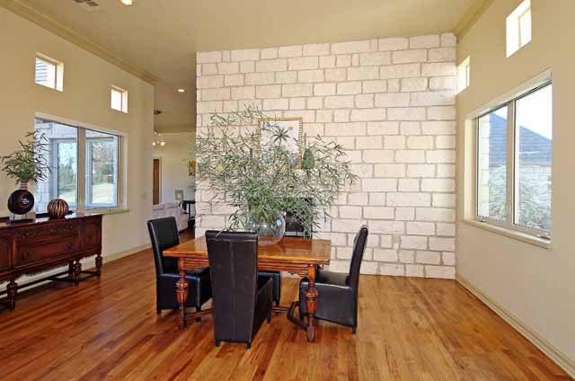 formal dining by fireplace