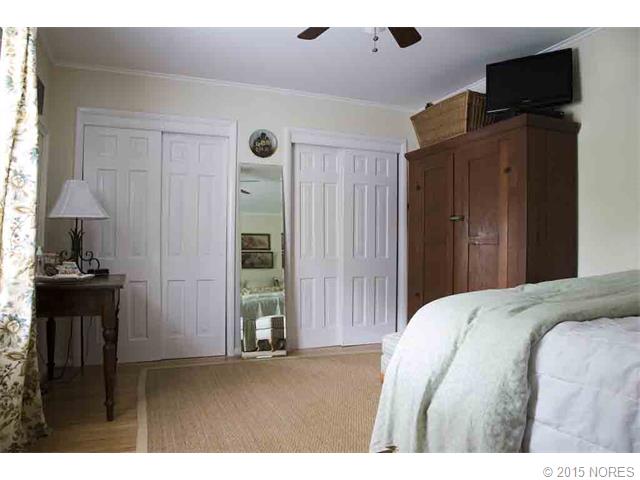 Large guest bedroom with 2 large closets.
