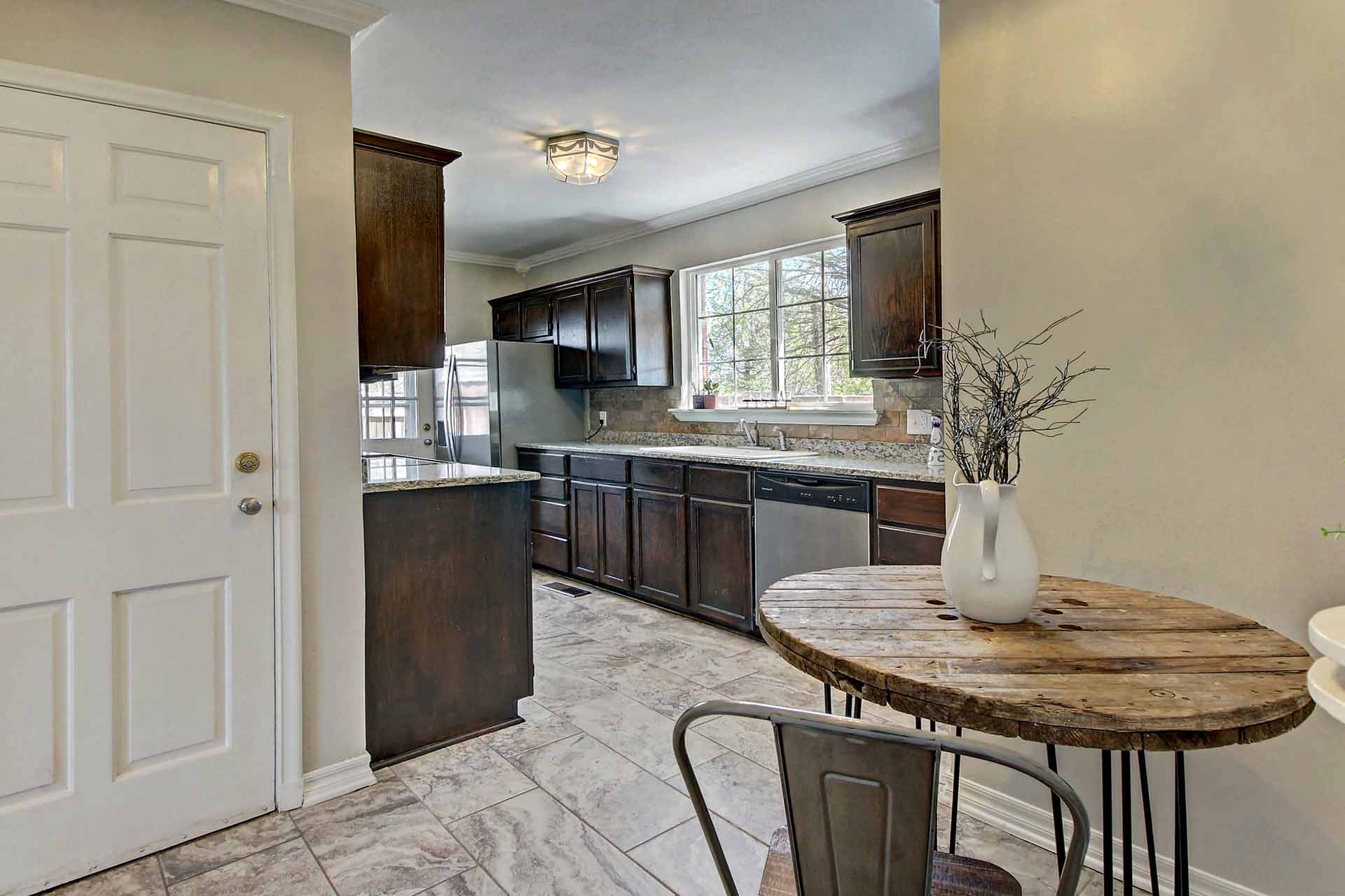 Kitchen Showing Door To Garage Midtown Tulsa Real Estate